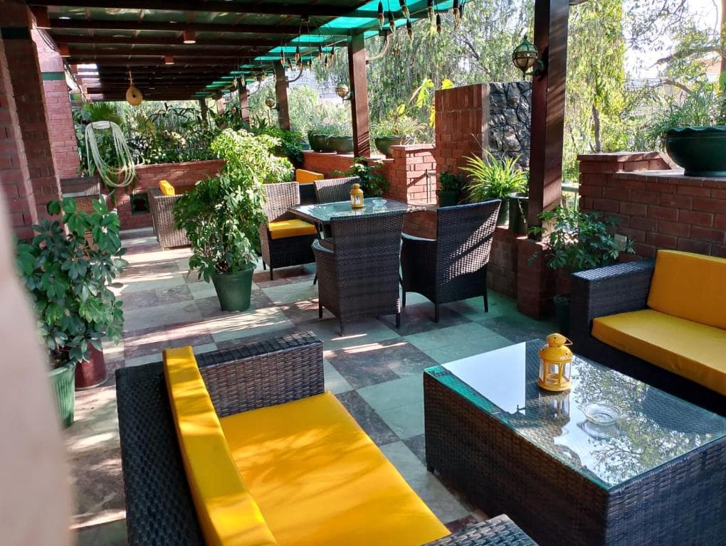 GreenLux Residency terrace seating and swing
